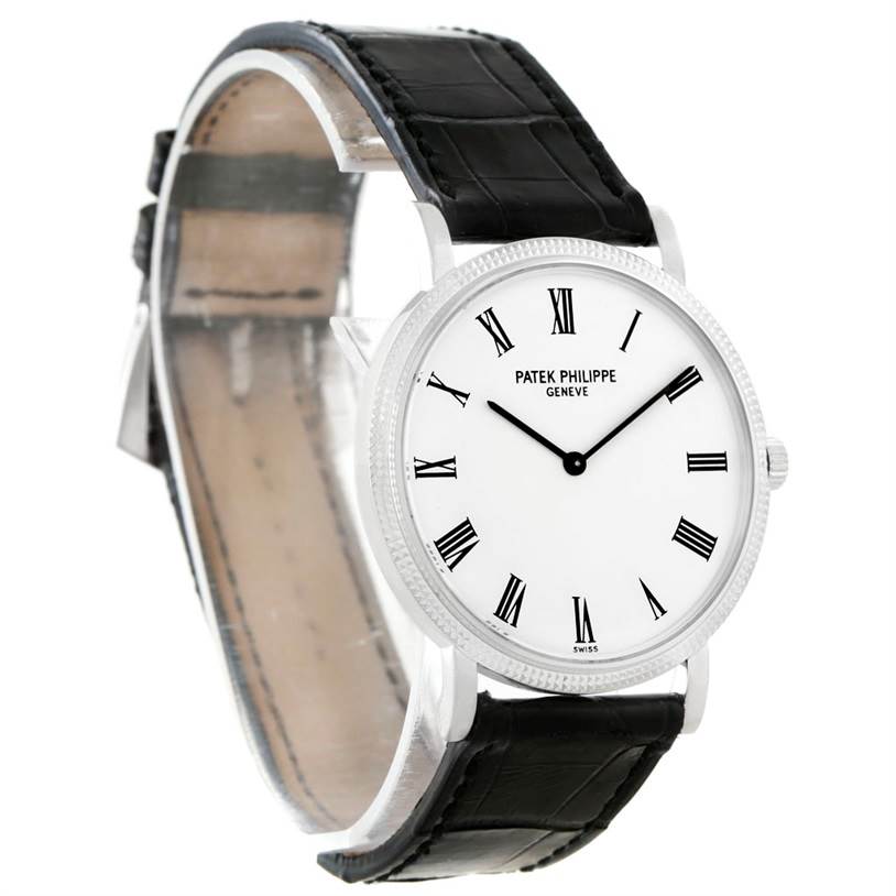 The image shows a Patek Philippe Calatrava 5120 Men's White Gold White Dial 5120 Men's White Gold White Dial watch at an angled view, highlighting the face, bezel, and leather strap.