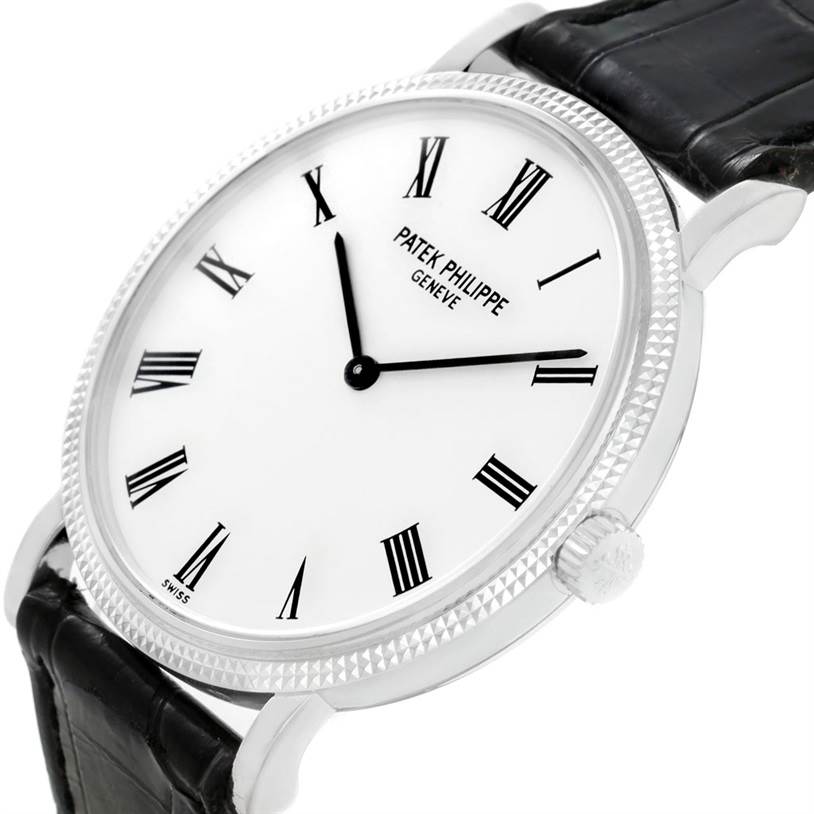 The image shows a Patek Philippe Calatrava 5120 Men's White Gold White Dial 5120 Men's White Gold White Dial watch at a slight angle, highlighting its face, Roman numerals, crown, and leather strap.