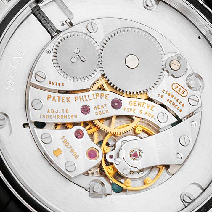 The image shows the intricate inner movement of the Patek Philippe Calatrava 5115G Men
s White Gold White Dial 5115G Men
s White Gold White Dial watch model.