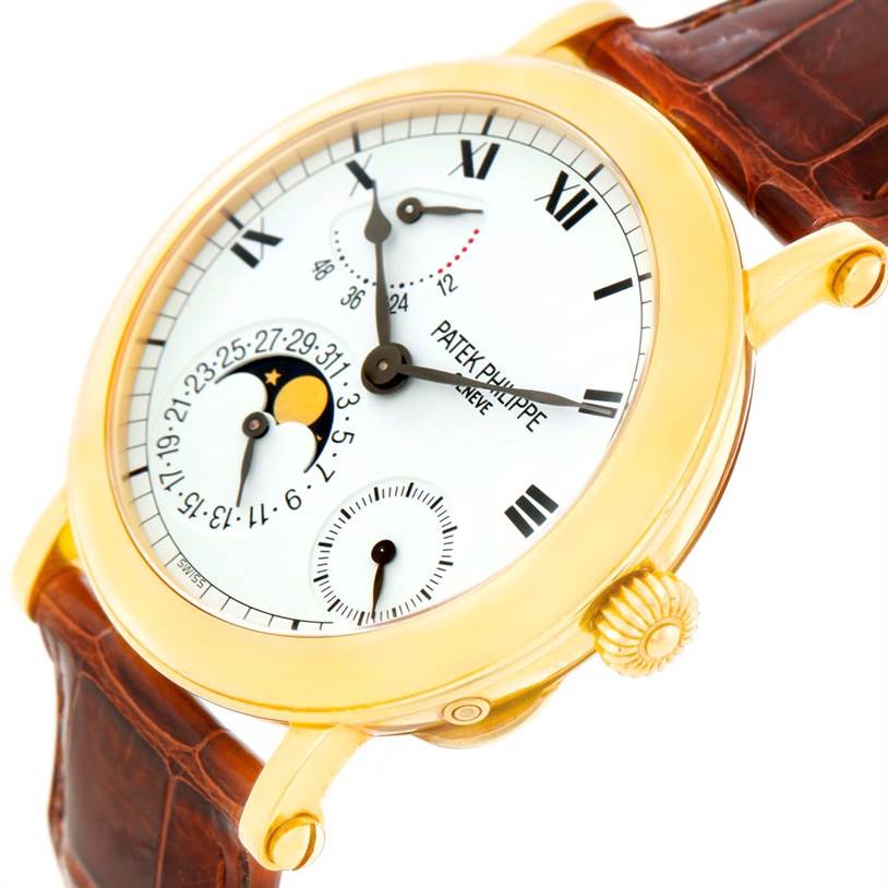 The image shows a side angle of the Patek Philippe 5054 Men's Yellow Gold White Dial 5054 Men's Yellow Gold White Dial Power Reserve Moonphase Yellow Gold Watch 5054, highlighting its face, buttons, and leather strap.