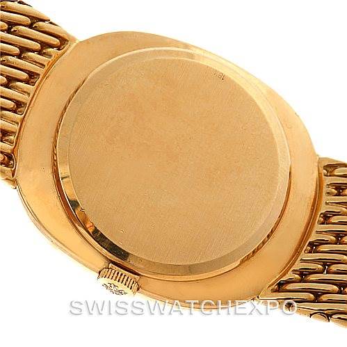 The image shows the back case and portion of the bracelet of a Patek Philippe Golden Ellipse 3848 Men's Yellow Gold Blue Dial 3848 Men's Yellow Gold Blue Dial watch from a centered angle.
