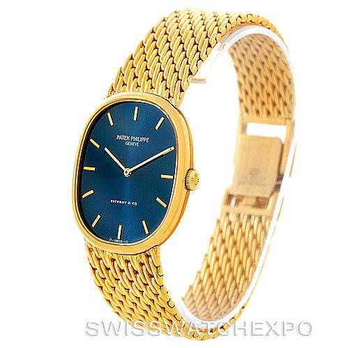 The image shows a Patek Philippe Golden Ellipse 3848 Men's Yellow Gold Blue Dial 3848 Men's Yellow Gold Blue Dial model watch from an angled side view, highlighting its blue dial, gold case, and mesh bracelet.