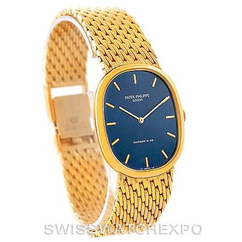 The image shows a Patek Philippe Golden Ellipse 3848 Men's Yellow Gold Blue Dial 3848 Men's Yellow Gold Blue Dial watch at a three-quarter angle view, highlighting its blue dial, golden case, and bracelet.