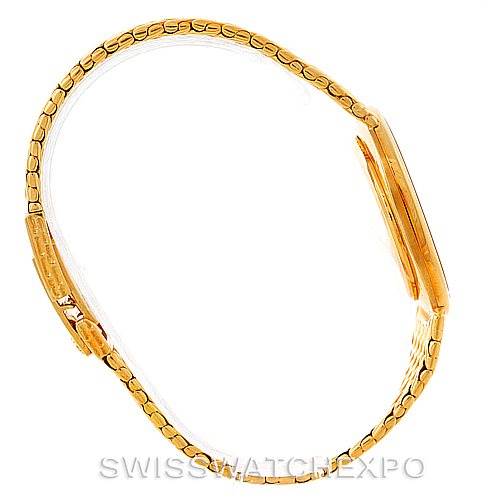 The image shows a side profile of the Patek Philippe Golden Ellipse 3848 Men's Yellow Gold Blue Dial 3848 Men's Yellow Gold Blue Dial watch displaying its gold bracelet and case.