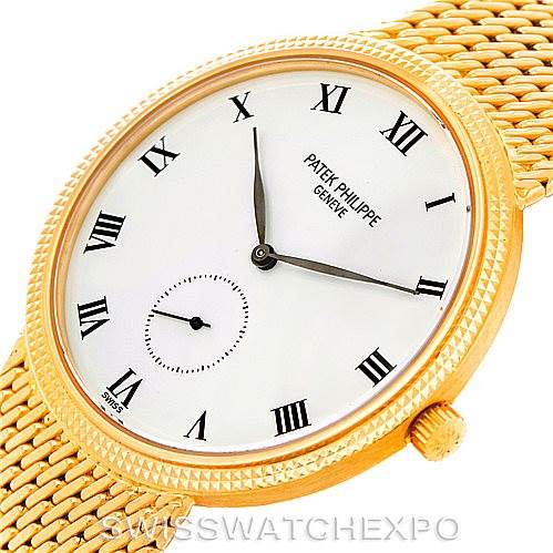 The image shows a close-up of the dial and mesh bracelet of a Patek Philippe Calatrava 3919 Men's Yellow Gold White Dial 3919 Men's Yellow Gold White Dial watch, angled slightly from the top right.