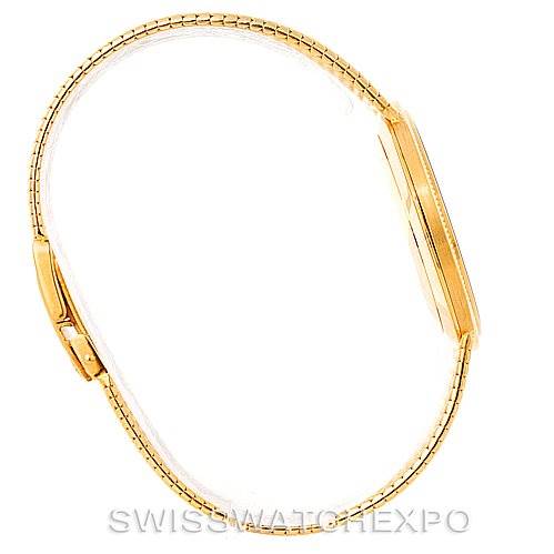 This image shows a side view of the Patek Philippe Calatrava 3919 Men's Yellow Gold White Dial 3919 Men's Yellow Gold White Dial watch, highlighting its gold case and bracelet.