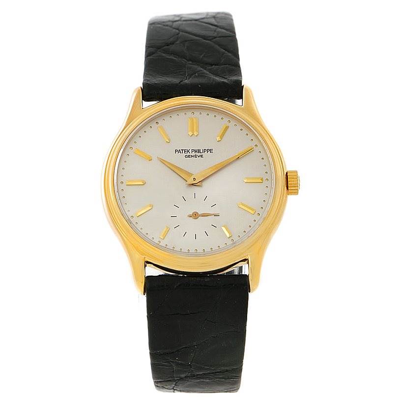 This image shows a front view of a Patek Philippe Calatrava 3923 Men's Yellow Gold Silver Dial 3923 Men's Yellow Gold Silver Dial watch, displaying the face, case, and strap.