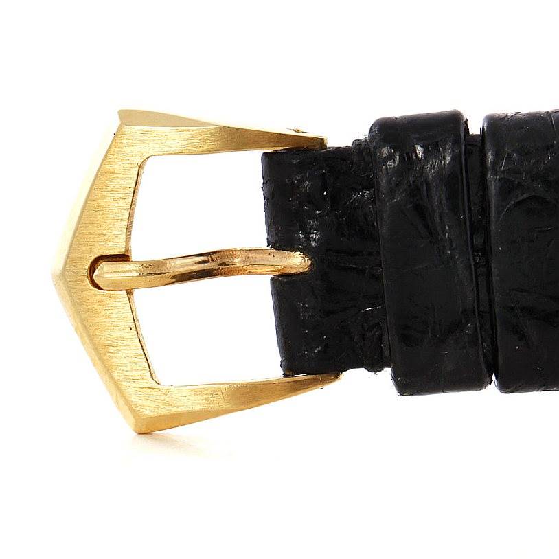 The image shows a close-up of the gold buckle on the strap of a Patek Philippe Calatrava 3923 Men's Yellow Gold Silver Dial 3923 Men's Yellow Gold Silver Dial watch.