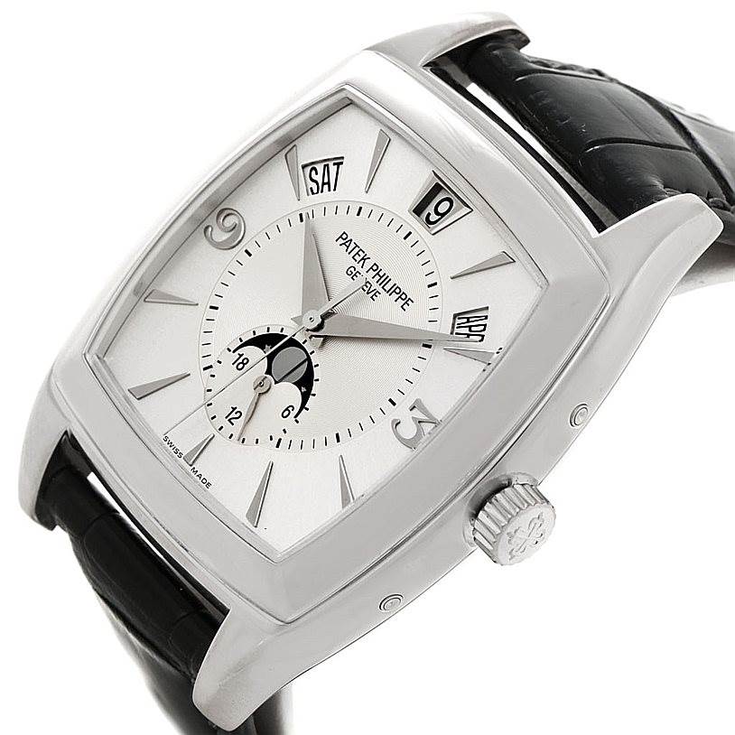 This is a close-up angled view of the Patek Philippe 5135G White Gold Silver Dial 5135G White Gold Silver Dial Gondolo Calendario 18K White Gold Watch 5135G, showcasing the dial, crown, and strap.