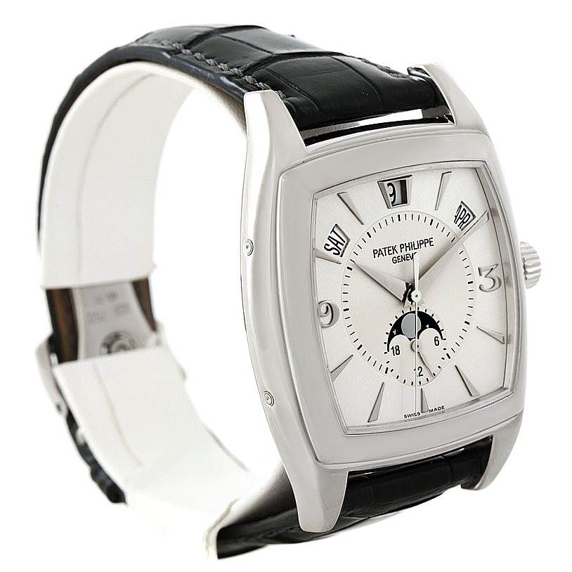 The image shows a Patek Philippe 5135G White Gold Silver Dial 5135G White Gold Silver Dial Gondolo Calendario 18K White Gold Watch 5135G, angled to display its face and part of the leather strap.