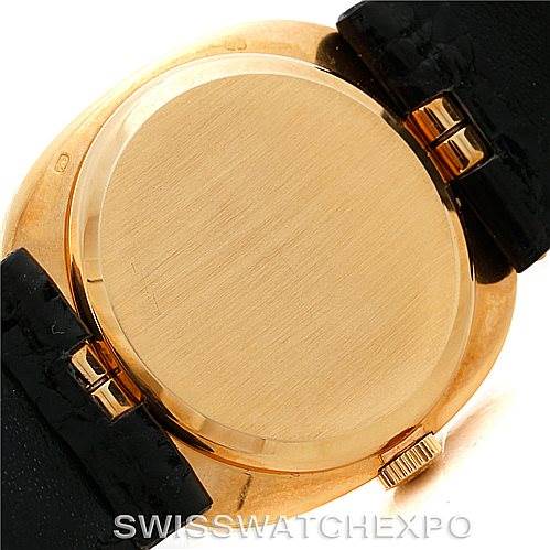The image shows the back case and part of the leather strap of a Patek Philippe Golden Ellipse 3948 Men's Yellow Gold White Dial 3948 Men's Yellow Gold White Dial watch.