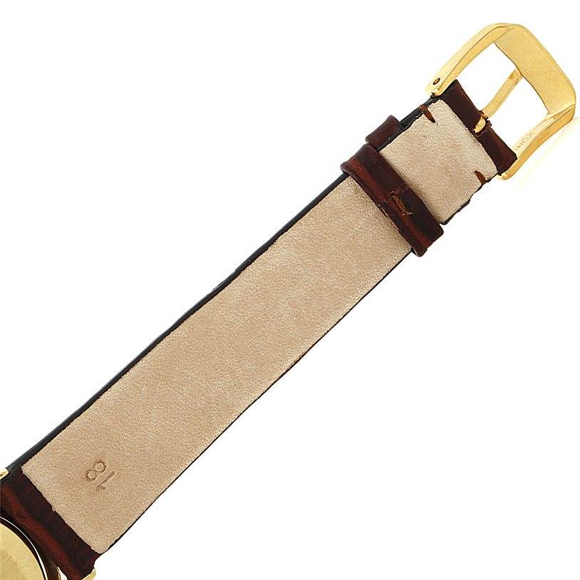 This image shows the strap and buckle of a Vintage Patek Philippe watch from an overhead angle.