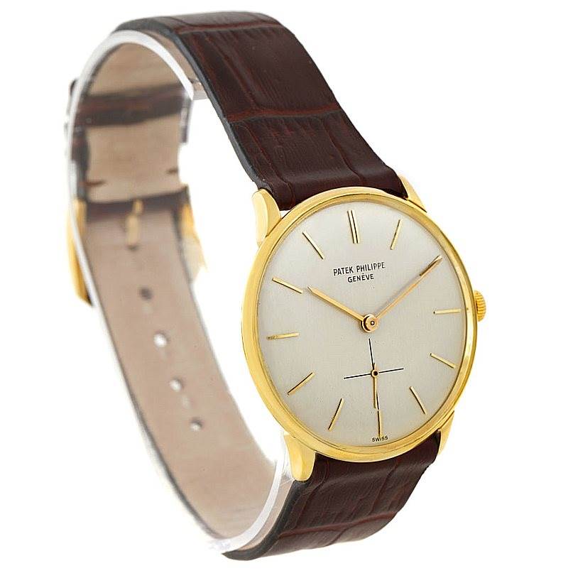 The image shows a Patek Philippe Vintage model watch from an angled front view, displaying the watch face and leather strap.
