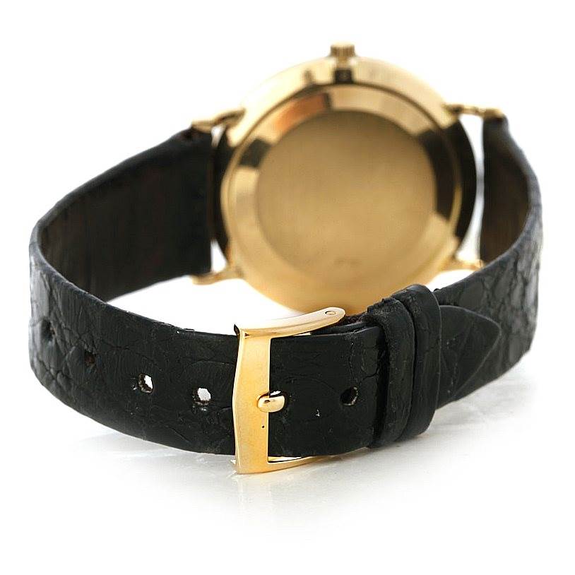 The image shows the back and strap of a Patek Philippe Calatrava 3919 Men's Yellow Gold White Dial 3919 Men's Yellow Gold White Dial watch from a rear angle.