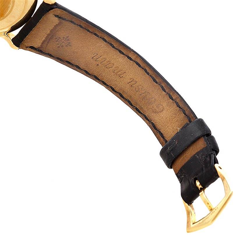 The image shows the leather strap and buckle of a Patek Philippe Calatrava 3919 Men's Yellow Gold White Dial 3919 Men's Yellow Gold White Dial watch from a close-up angle.