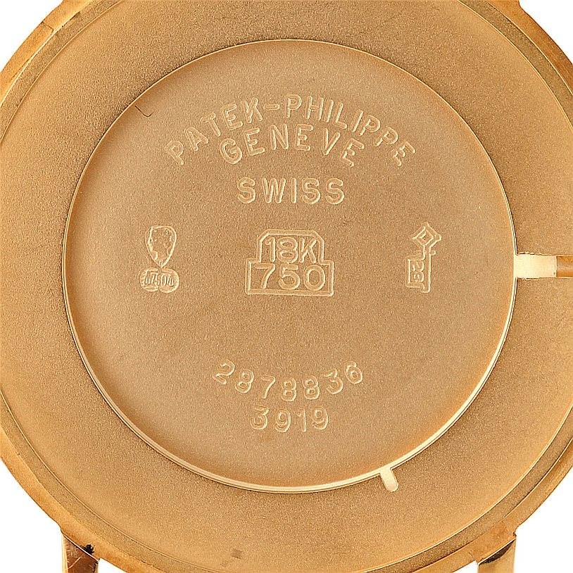 This is the case back of a Patek Philippe Calatrava 3919 Men's Yellow Gold White Dial 3919 Men's Yellow Gold White Dial watch, displaying its markings and engravings.