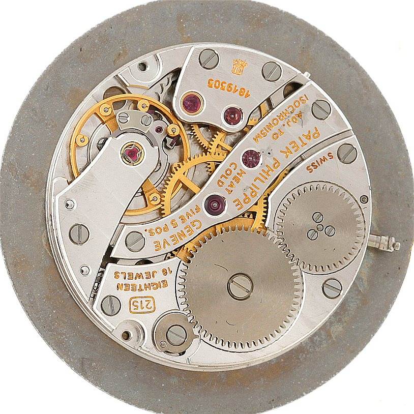 This image shows the internal mechanical movement of a Patek Philippe Calatrava 3919 Men's Yellow Gold White Dial 3919 Men's Yellow Gold White Dial watch from a top-down angle.