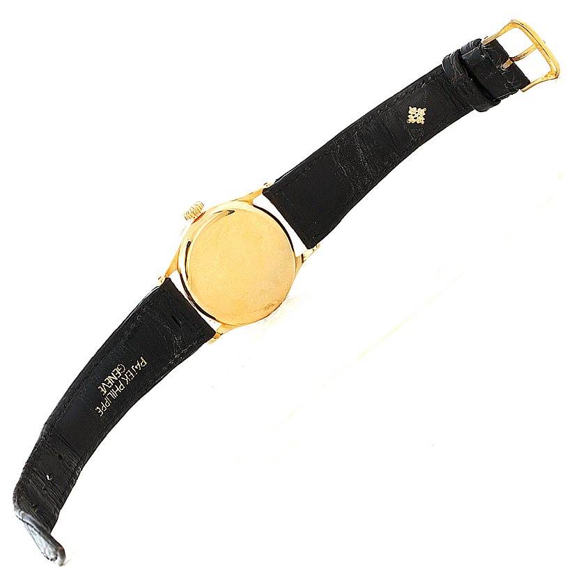 The image shows the back case and leather strap of a Vintage Patek Philippe watch.