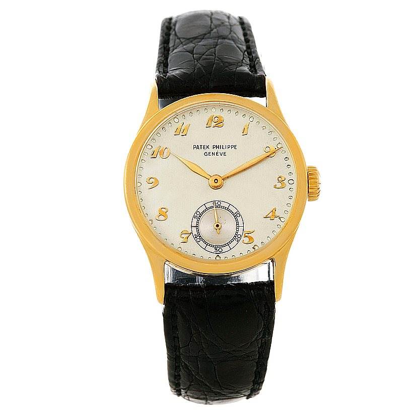 The image shows a frontal view of a Vintage Patek Philippe watch, highlighting its dial, hands, and black leather strap.