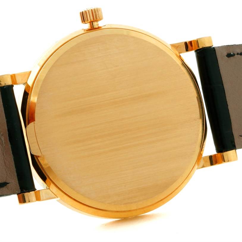 This image shows the back case and crown of a Patek Philippe Calatrava 3802 Men's Yellow Gold White Dial 3802 Men's Yellow Gold White Dial watch.