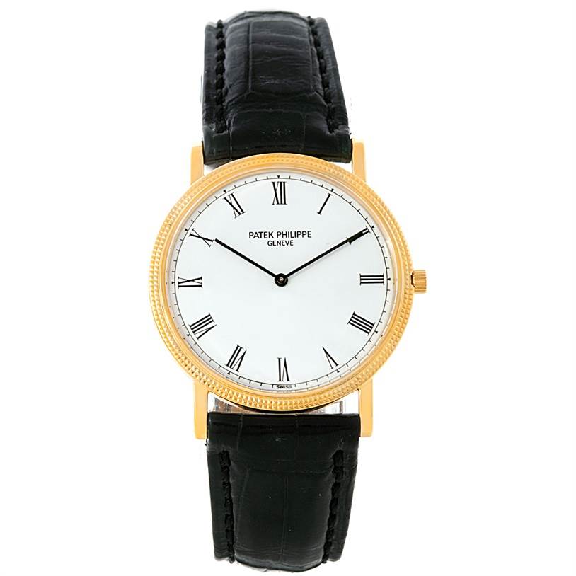 This image shows a frontal view of the Patek Philippe Calatrava 3520 Men's Yellow Gold White Dial 3520 Men's Yellow Gold White Dial watch, featuring the dial, case, and leather strap.
