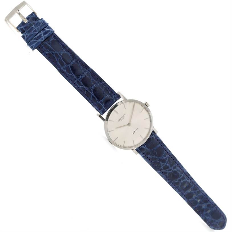 This image shows a Vintage Patek Philippe watch with a blue leather strap, displayed flat and viewed from above.