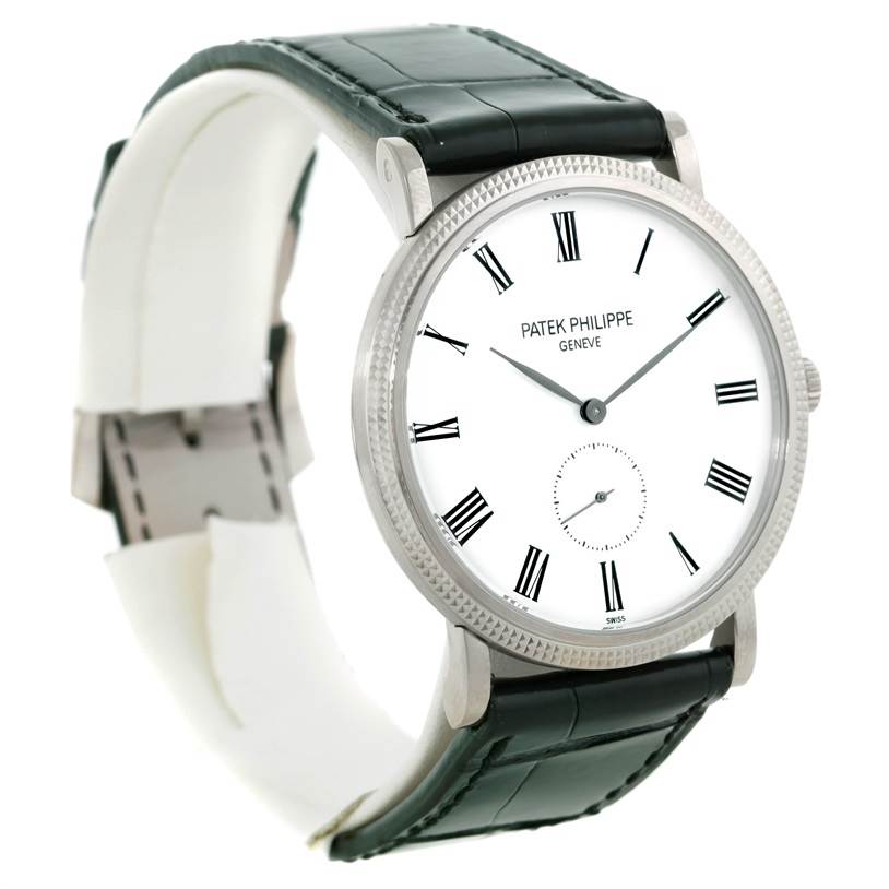The image shows a front angle of the Patek Philippe Calatrava 5119G Men's White Gold White Dial 5119G Men's White Gold White Dial watch displaying its white dial, Roman numerals, and black leather strap.