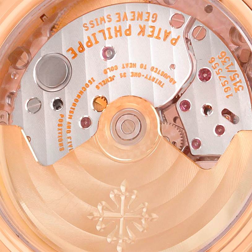 This image shows the movement and inner workings of a Patek Philippe 5059R Men
s Rose Gold White Dial 5059R Men
s Rose Gold White Dial Perpetual Calendar Retrograde 18k Rose Gold Watch 5059R model.