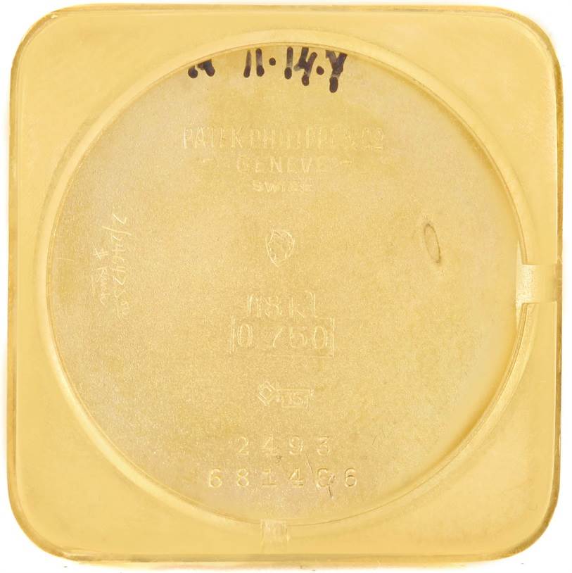 This image shows the inside case back of a Vintage Patek Philippe watch, highlighting its engravings and markings.