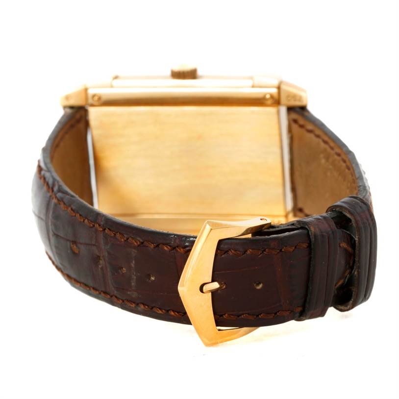 This image shows the back of a Patek Philippe Gondolo 5111J Men's Yellow Gold Silver Dial 5111J Men's Yellow Gold Silver Dial watch, highlighting the brown leather strap, gold buckle, and case.