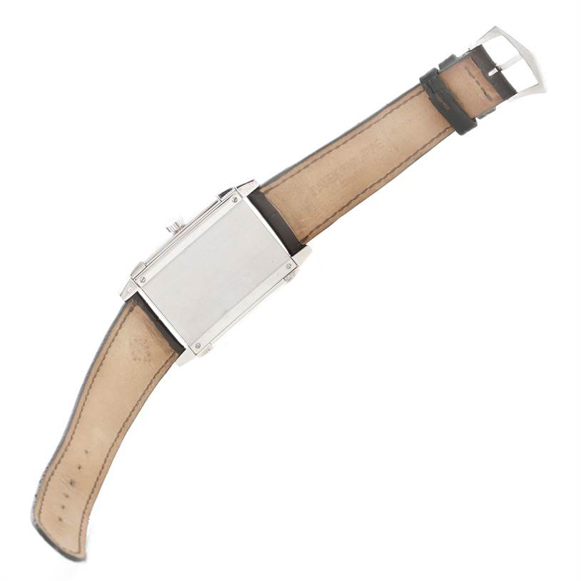 The image shows the back view of a Patek Philippe Gondolo 5111G Men's White Gold Silver Dial 5111G Men's White Gold Silver Dial watch, including its leather strap and metal buckle.