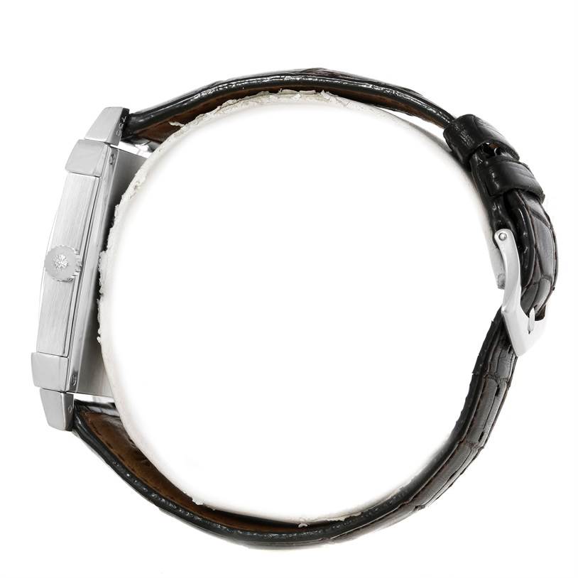 This image shows a side view of a Patek Philippe Gondolo 5111G Men's White Gold Silver Dial 5111G Men's White Gold Silver Dial watch, displaying the case, crown, and leather strap with buckle.