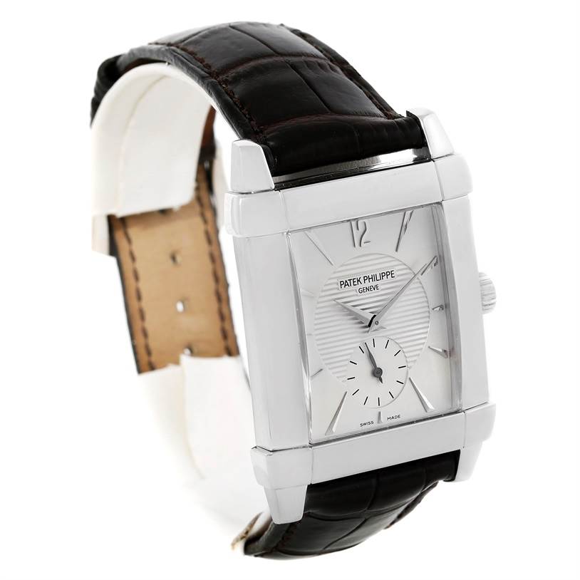 The image shows a Patek Philippe Gondolo 5111G Men's White Gold Silver Dial 5111G Men's White Gold Silver Dial watch at a three-quarter angle displaying the face and part of the strap.