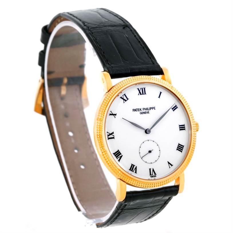 The image shows a frontal and slightly angled view of a Patek Philippe Calatrava 3919 Men's Yellow Gold White Dial 3919 Men's Yellow Gold White Dial watch, highlighting its dial, case, and strap.
