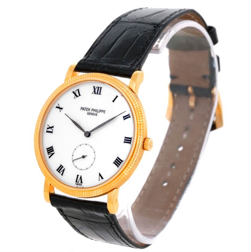 The image shows a side-angle view of a Patek Philippe Calatrava 3919 Men's Yellow Gold White Dial 3919 Men's Yellow Gold White Dial watch featuring a gold casing and black leather strap.