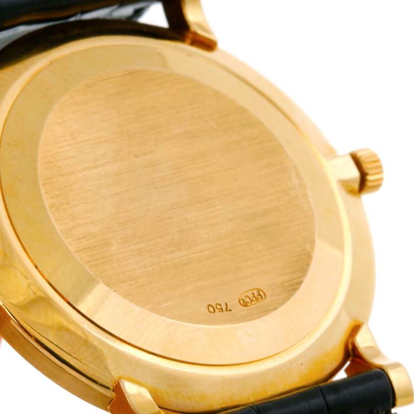 The image shows the back case and part of the strap of a Patek Philippe Calatrava 3919 Men's Yellow Gold White Dial 3919 Men's Yellow Gold White Dial watch at an angled close-up.