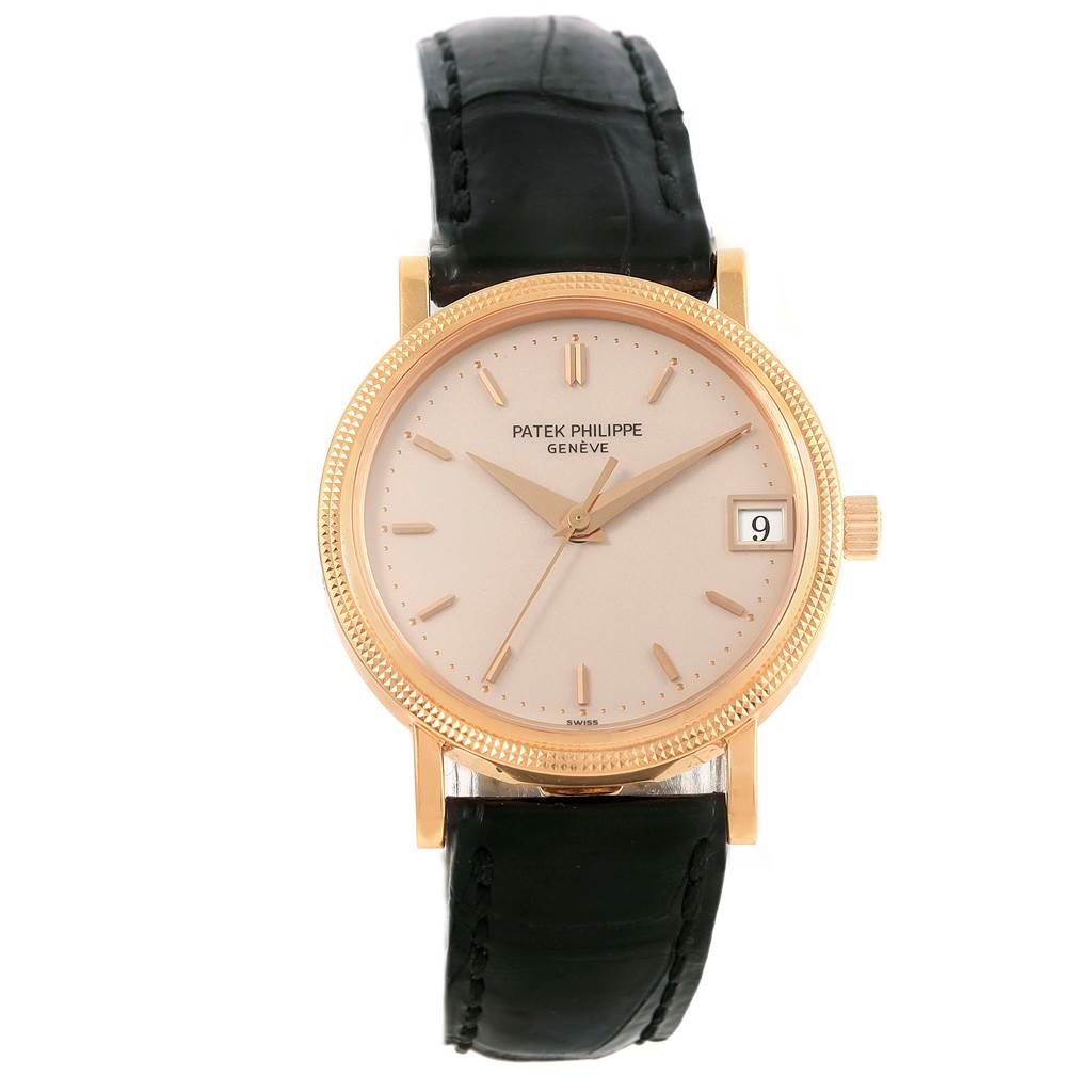 The image shows a front view of a Patek Philippe Calatrava 3802R Men's Rose Gold Beige Dial 3802R Men's Rose Gold Beige Dial watch with a gold case, beige dial, black leather strap, and date display.