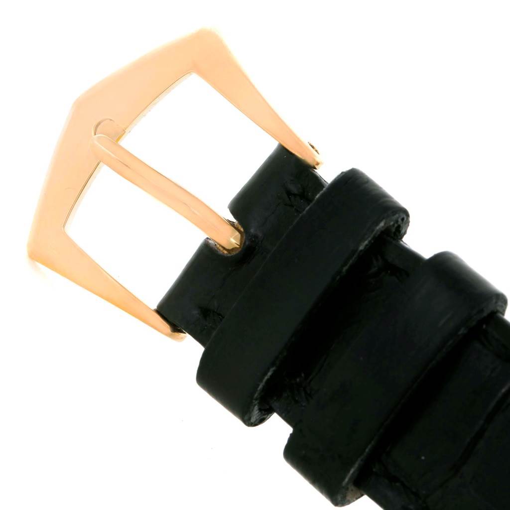 This image shows a close-up of the buckle and part of the leather strap of a Patek Philippe Calatrava 3802R Men's Rose Gold Beige Dial 3802R Men's Rose Gold Beige Dial watch.