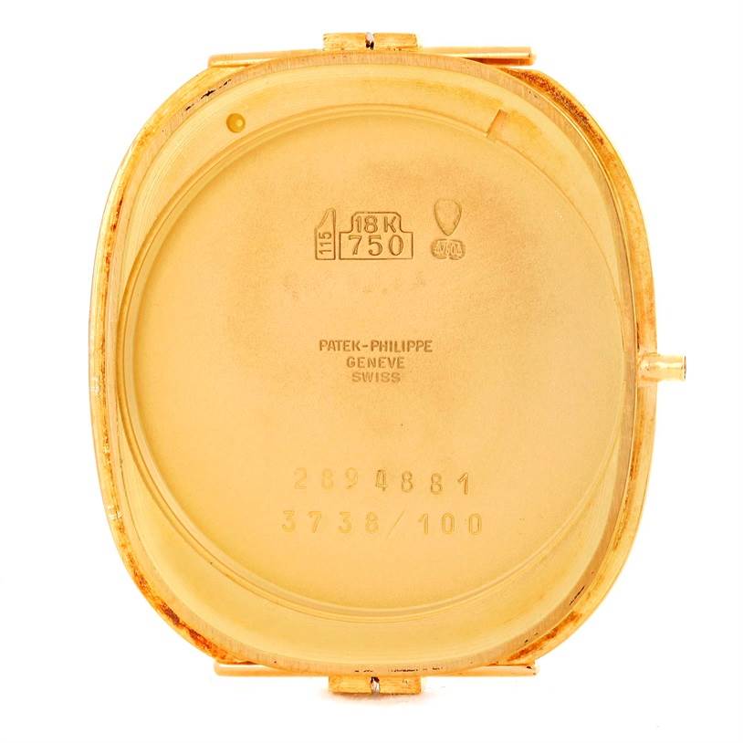 This image shows the interior back cover of the Patek Philippe Golden Ellipse 3738 Men's Yellow Gold Blue Dial 3738 Men's Yellow Gold Blue Dial watch, displaying inscriptions and hallmarks.