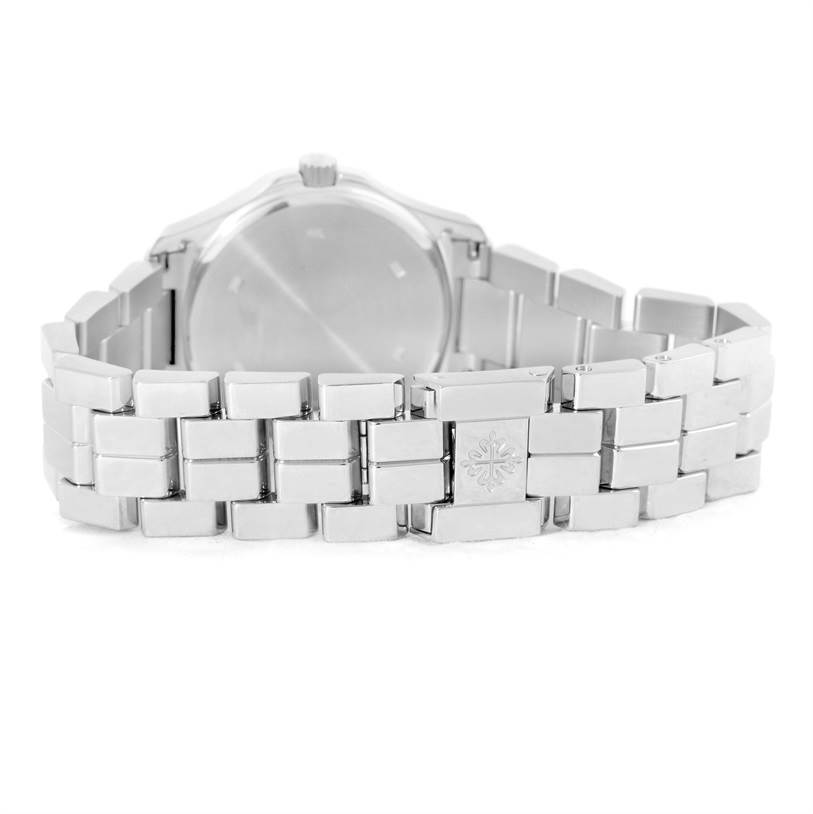 The image shows the back and bracelet of a Patek Philippe Aquanaut 4960/1A-001 Women's Stainless Steel Black Dial 4960/1A-001 Women's Stainless Steel Black Dial watch, focusing on the clasp with the brand's emblem.