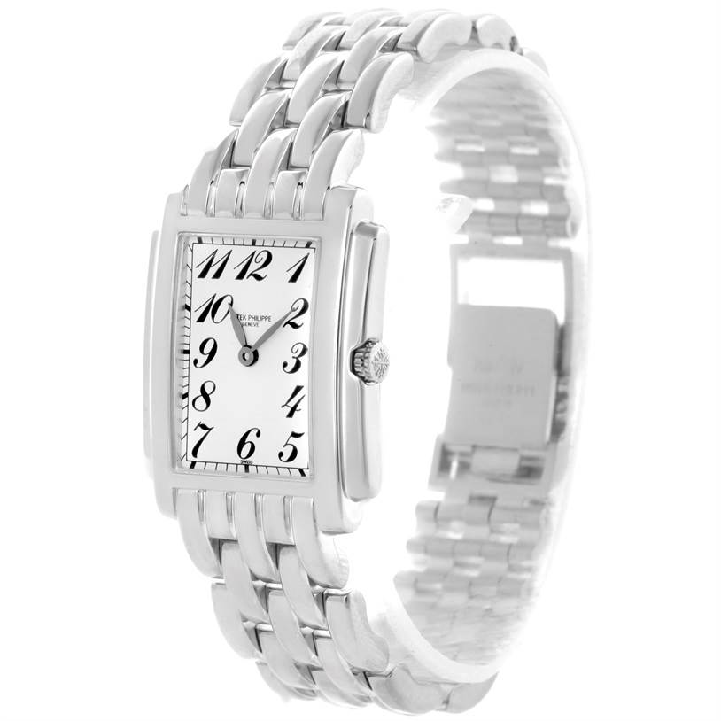 The image shows a side angle of the Patek Philippe Gondolo 4824 Women's White Gold White Dial 4824 Women's White Gold White Dial watch, highlighting its rectangular face and metallic bracelet.