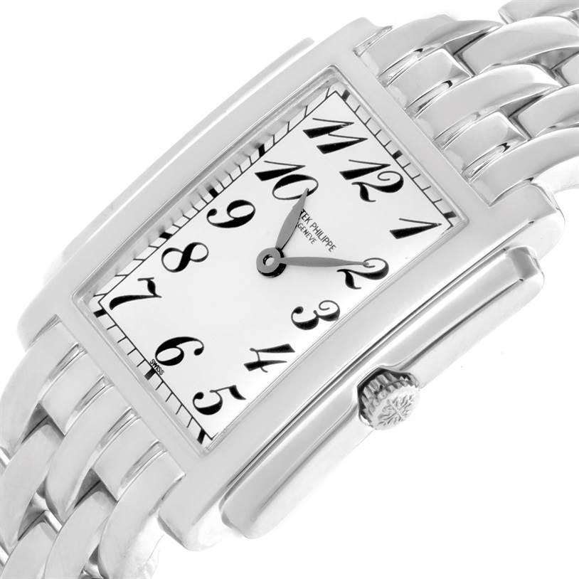 This image shows a close-up, angled view of the face, crown, and part of the bracelet of the Patek Philippe Gondolo 4824 Women's White Gold White Dial 4824 Women's White Gold White Dial watch.