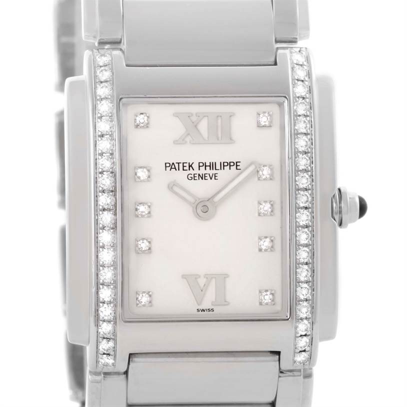 This image shows a front view of the dial, bezel, and part of the band of the Patek Philippe Twenty-4 4910/10A-011 Women's Stainless Steel Silver Dial 4910/10A-011 Women's Stainless Steel Silver Dial watch.