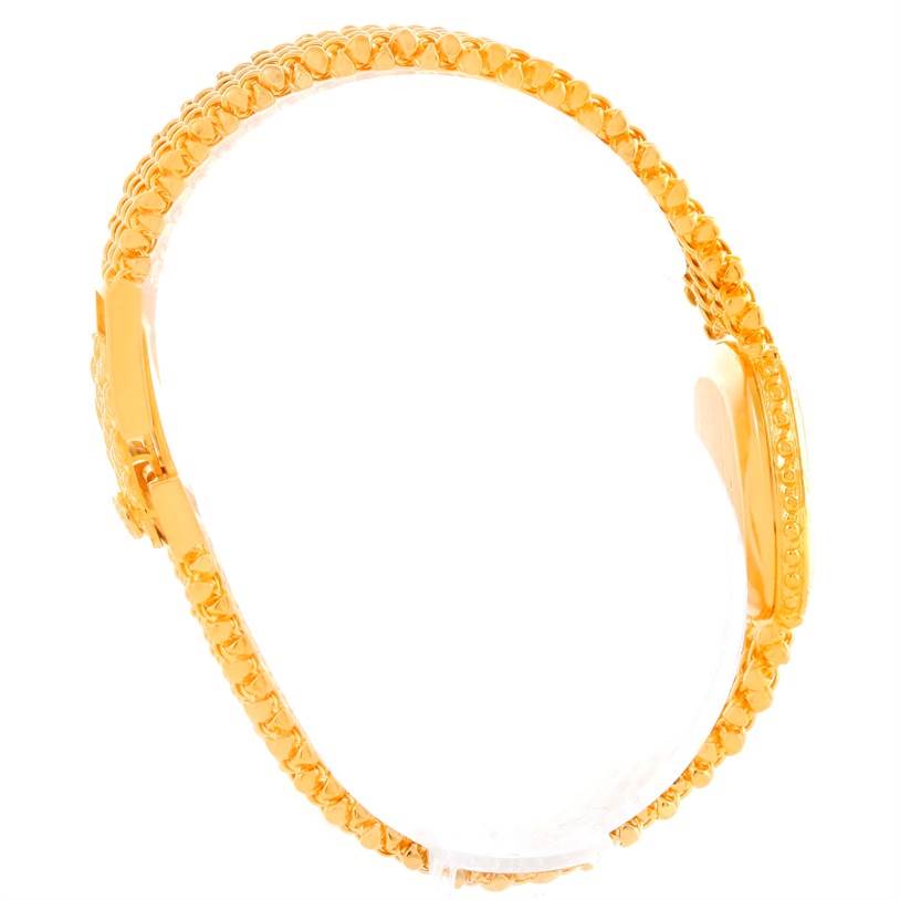 This image shows a side view of a gold bracelet band from a vintage Patek Philippe watch.