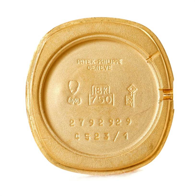 The image shows the inner case back of a Vintage Patek Philippe watch, displaying its markings and serial numbers.