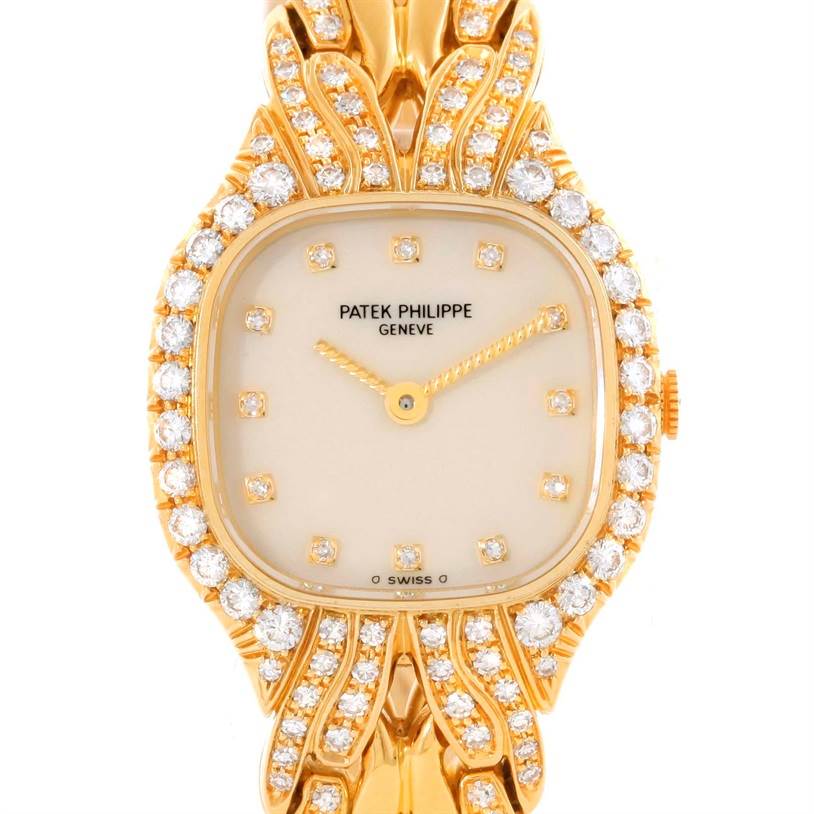 This image shows a front view of the Patek Philippe La Flamme  4815/3 Women's Yellow Gold Champagne Dial 4815/3 Women's Yellow Gold Champagne Dialwatch, highlighting its diamond-encrusted bezel and gold case.