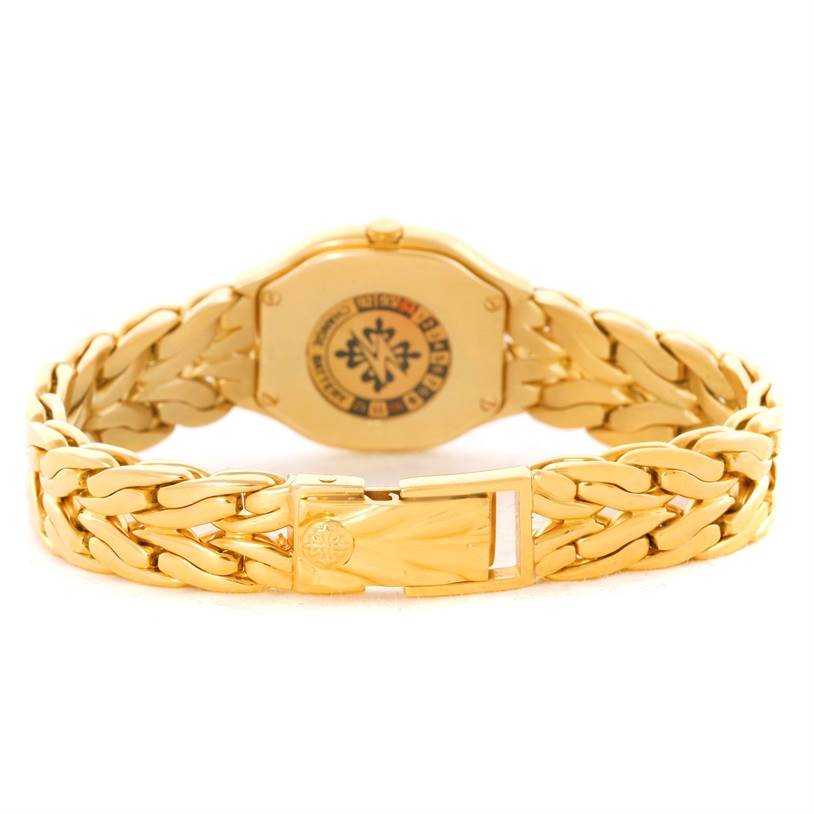 The image shows the rear view of a Patek Philippe La Flamme  4815/3 Women's Yellow Gold Champagne Dial 4815/3 Women's Yellow Gold Champagne Dialwatch, highlighting the bracelet and clasp.