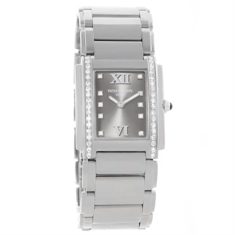 The image shows a front view of the Patek Philippe Twenty-4 4910/10A-010 Women's Stainless Steel Grey Dial 4910/10A-010 Women's Stainless Steel Grey Dial watch, highlighting its face, case, bracelet, and diamond detailing.