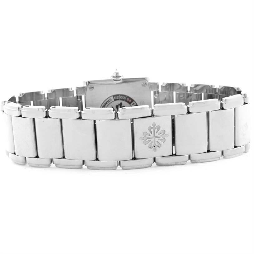 The image shows the back and bracelet of the Patek Philippe Twenty-4 4908/200G-011 Women's White Gold Silver Dial 4908/200G-011 Women's White Gold Silver Dial watch at a rear angle.