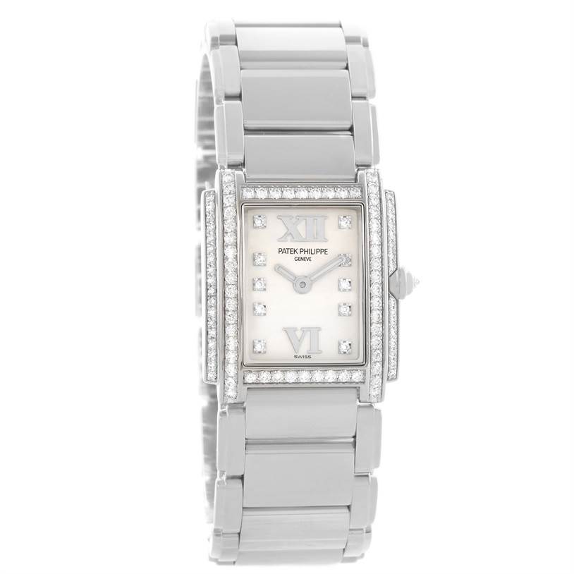 This image shows a front view of the Patek Philippe Twenty-4 4908/200G-011 Women's White Gold Silver Dial 4908/200G-011 Women's White Gold Silver Dial watch, highlighting its rectangular dial and metal bracelet.